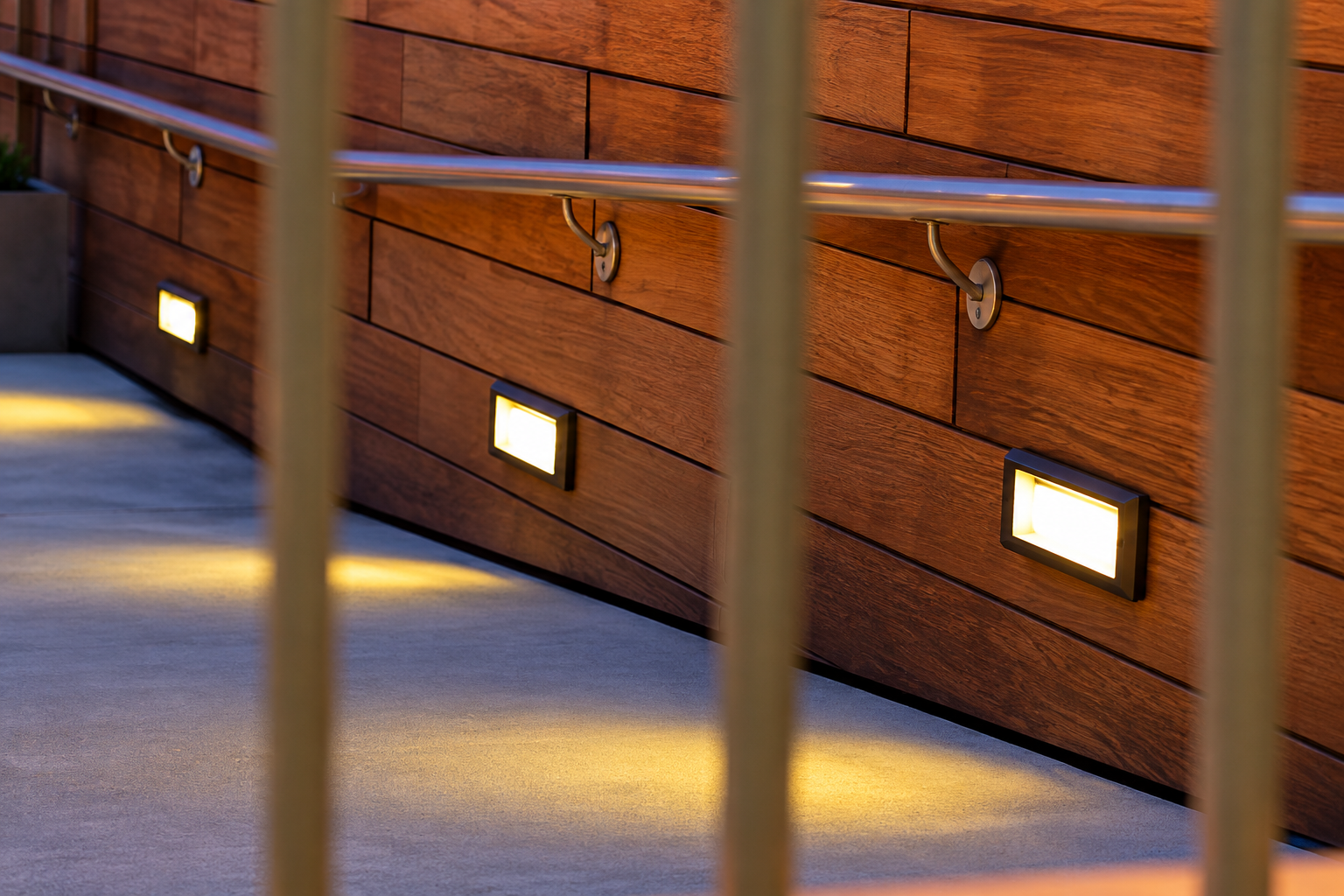 Recessed step lighting along an interior stairway